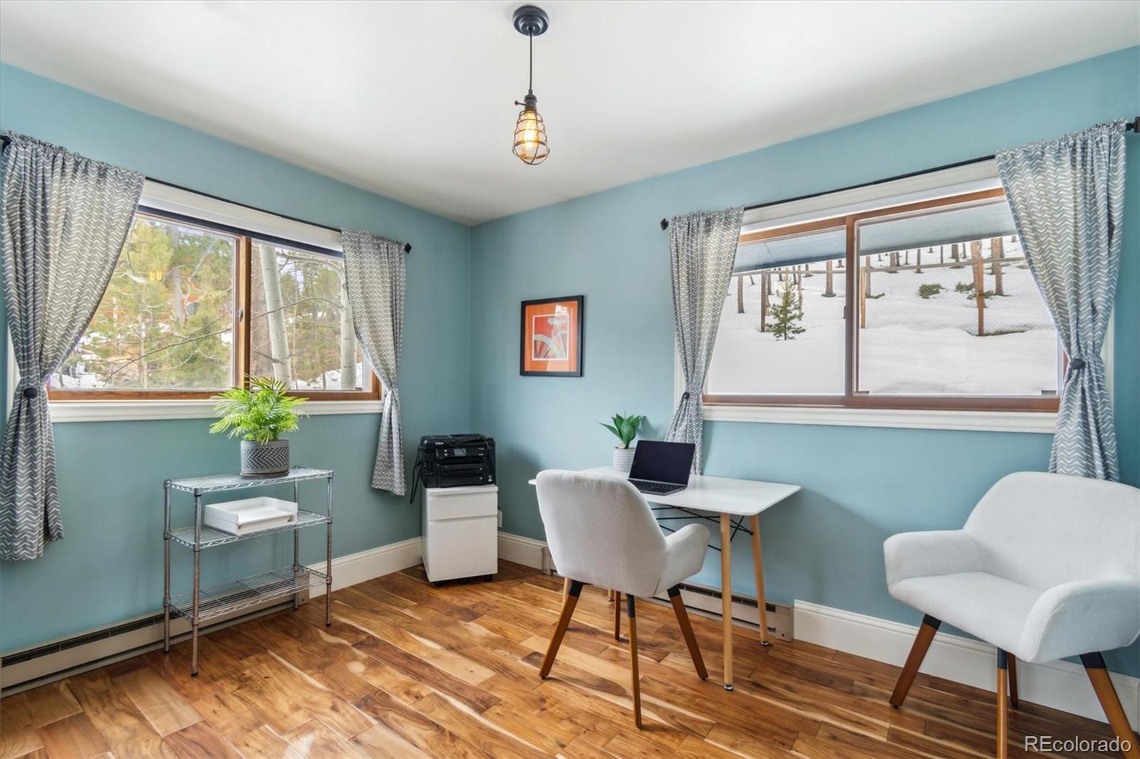 779 Aspen Way Evergreen, CO 80439 - Photo 14 of 49 a workspace with furniture and a window