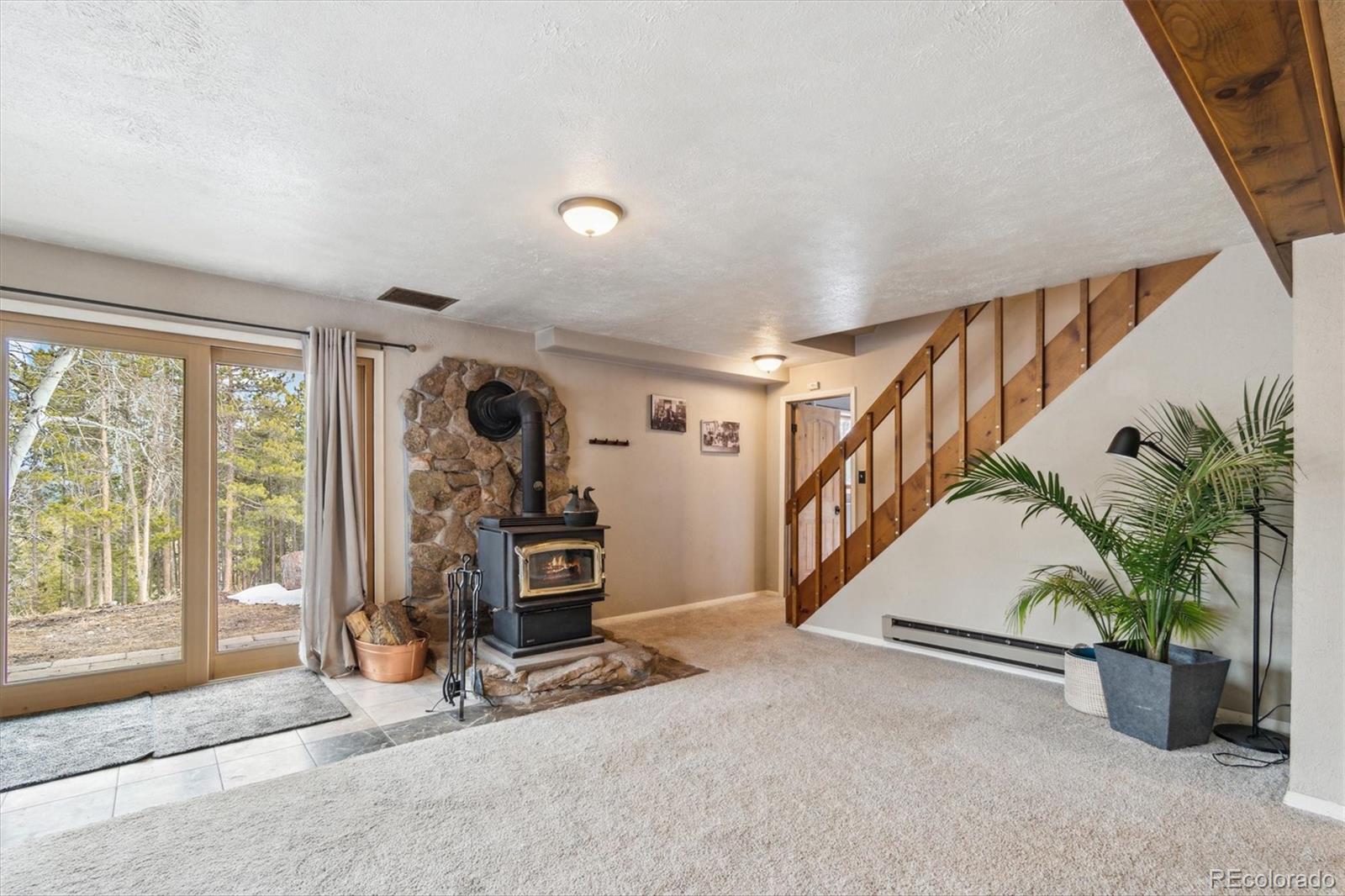 779 Aspen Way Evergreen, CO 80439 - Photo 22 of 49 a view of a room with gym equipment