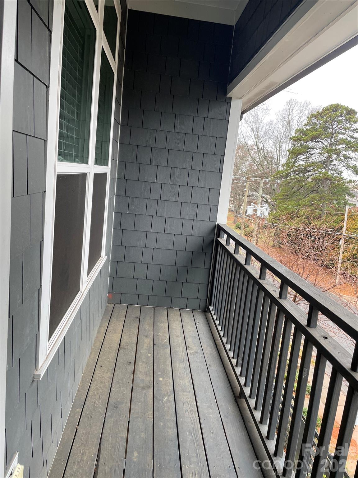 935 McAlway Road, Unit 303 Charlotte, NC 28211 - Photo 15 of 16 a view of balcony with wooden floor