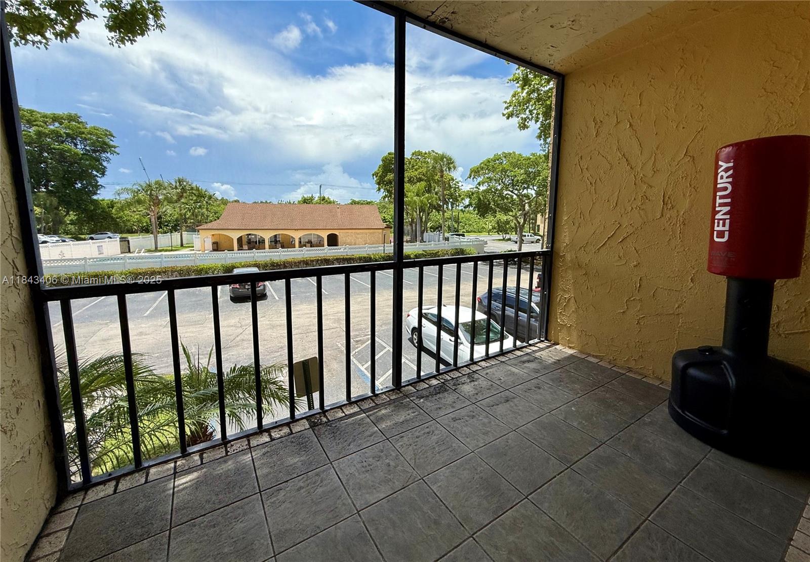 480 Northwest 20th Street, Unit 207 Boca Raton, FL 33431 - Photo 14 of 26 a view of a balcony with chairs