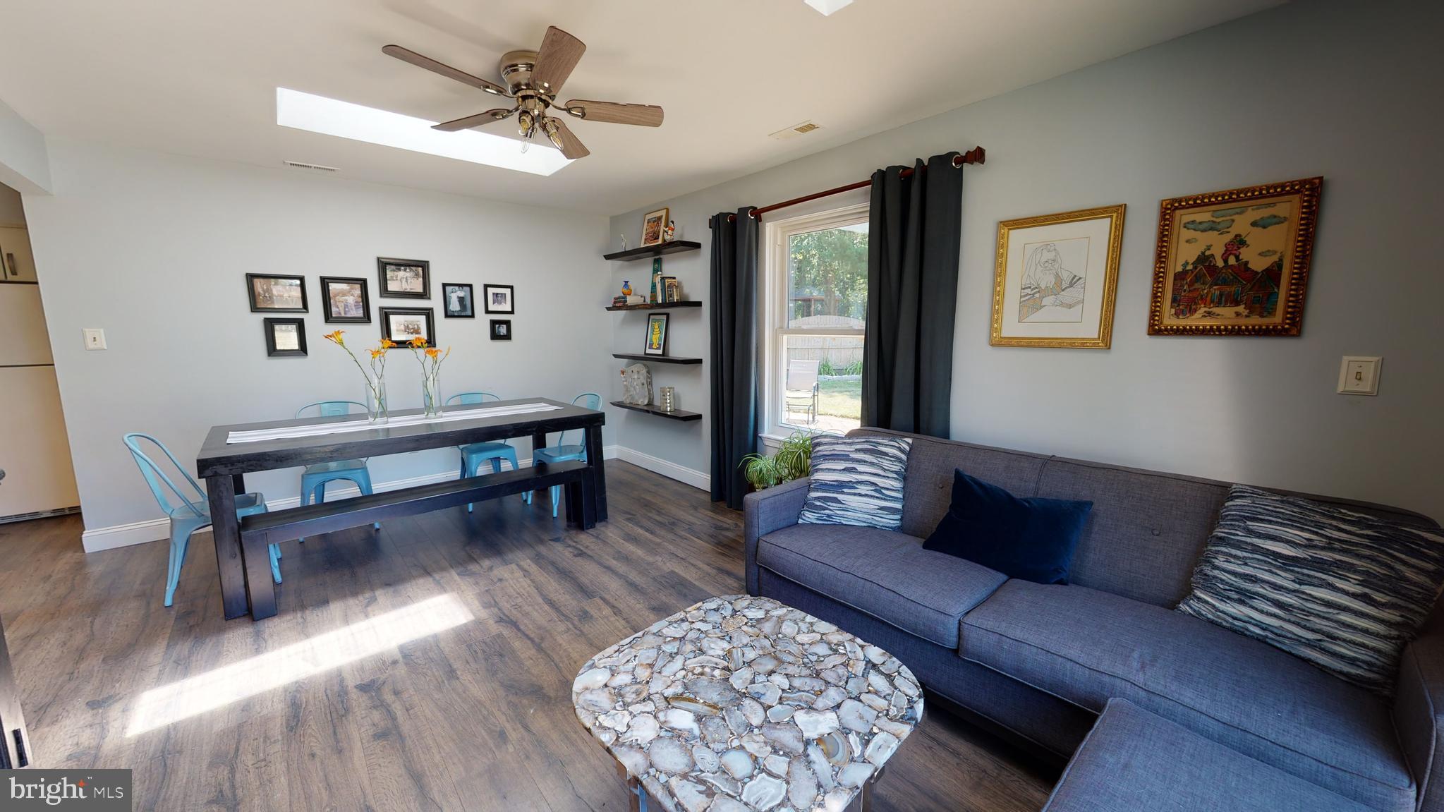 5 Carlton Avenue Evesham, NJ 08053 - Photo 12 of 33 a living room with furniture rug and window