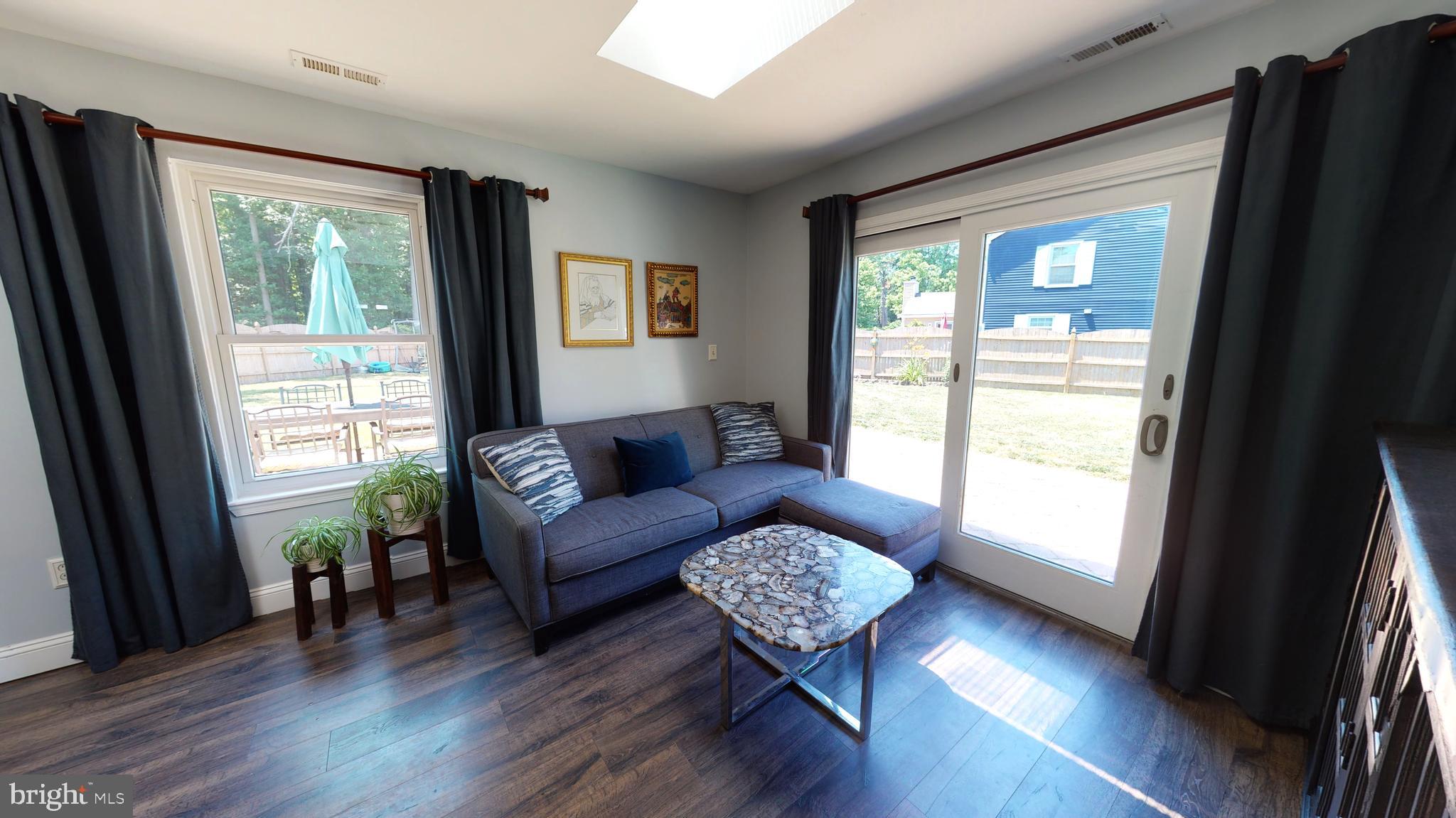 5 Carlton Avenue Evesham, NJ 08053 - Photo 16 of 33 a living room with furniture and wooden floor