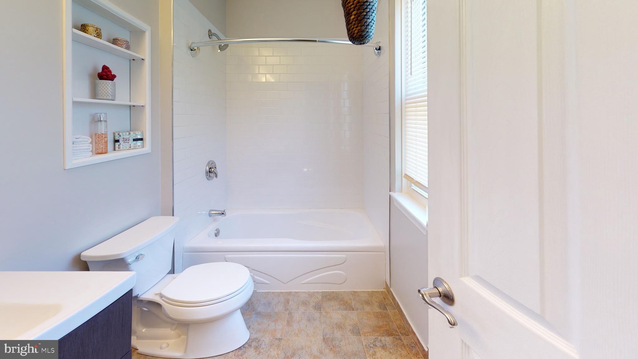 5 Carlton Avenue Evesham, NJ 08053 - Photo 21 of 33 a bathroom with a toilet and a bathtub