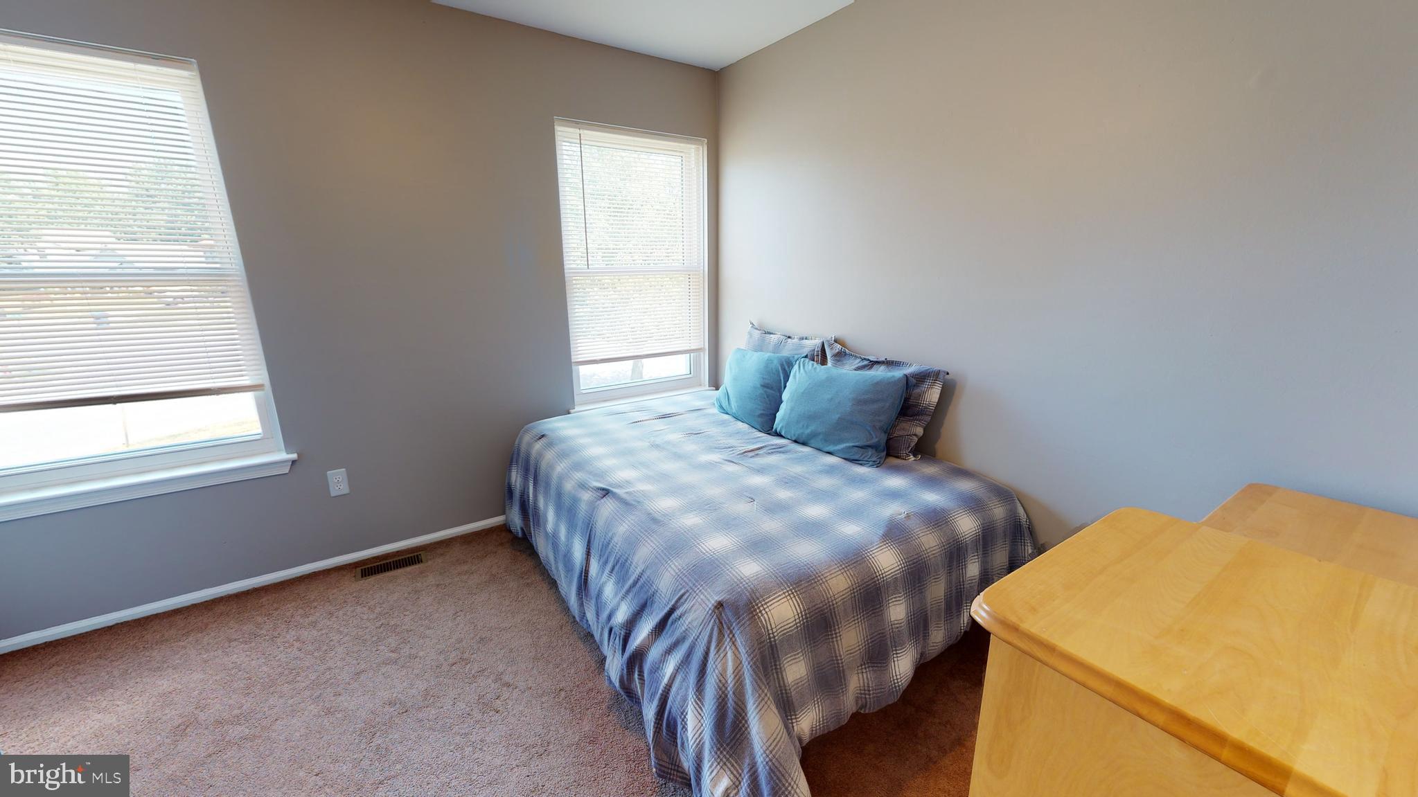 5 Carlton Avenue Evesham, NJ 08053 - Photo 22 of 33 a bedroom with a bed and a window