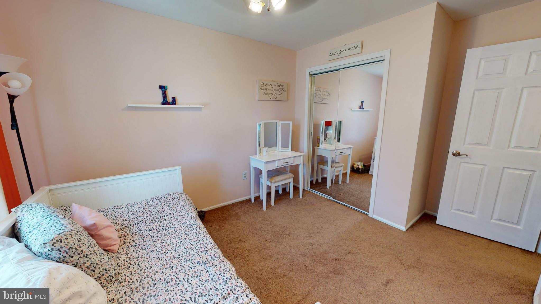 5 Carlton Avenue Evesham, NJ 08053 - Photo 28 of 33 a bedroom with a bed and a table in it