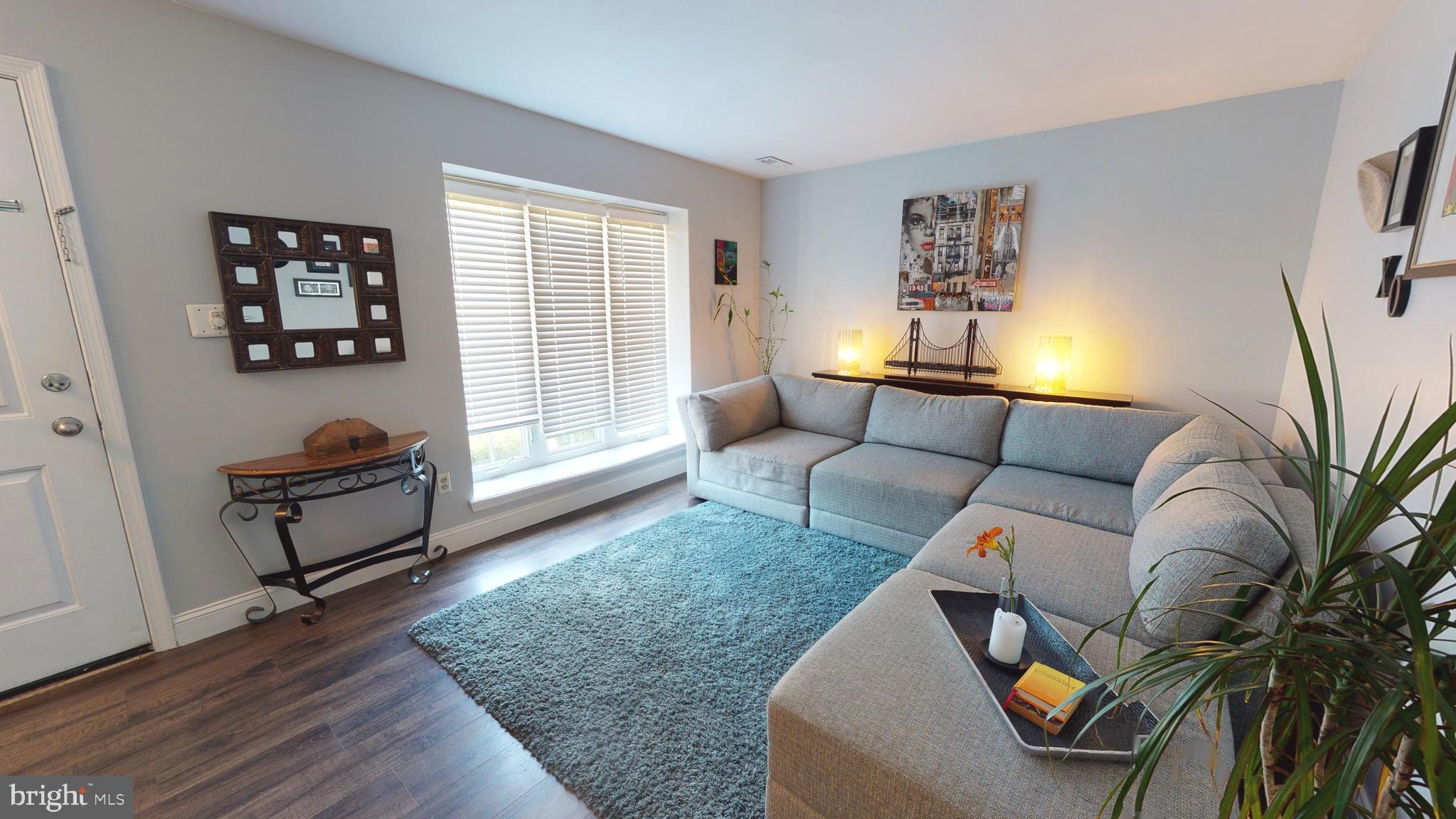 5 Carlton Avenue Evesham, NJ 08053 - Photo 4 of 33 a living room with furniture and a window