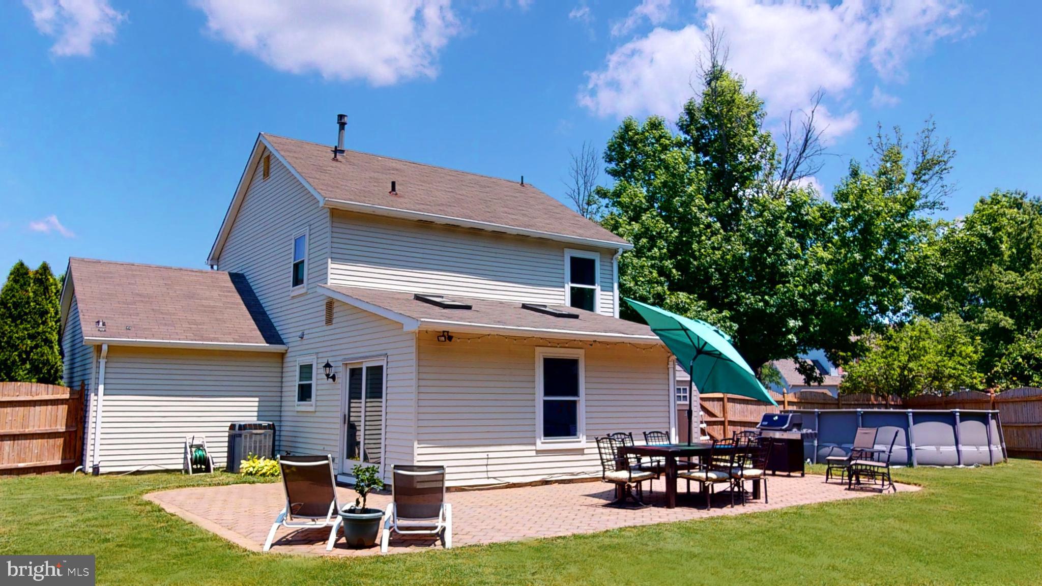 5 Carlton Avenue Evesham, NJ 08053 - Photo 31 of 33 a front view of house with yard and outdoor seating