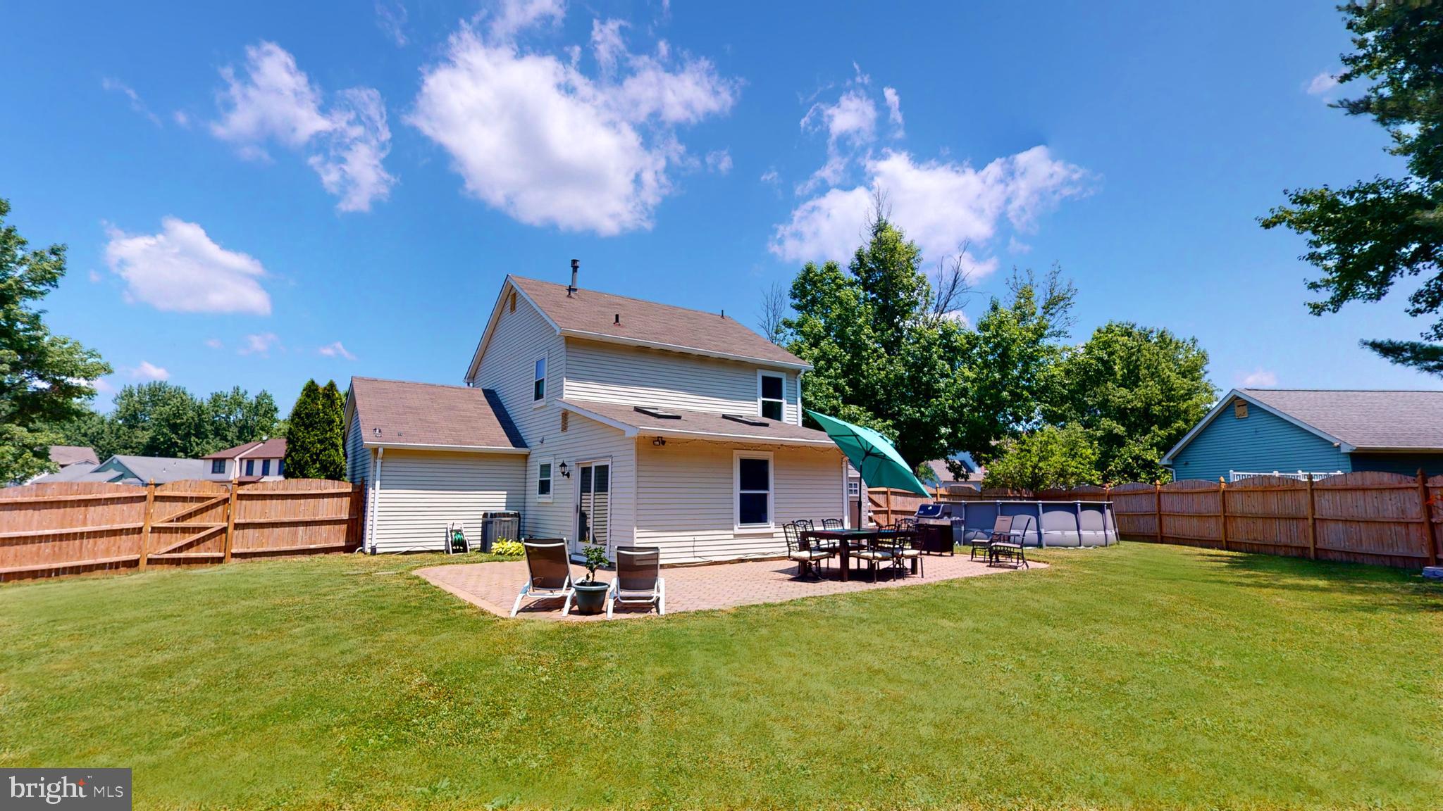 5 Carlton Avenue Evesham, NJ 08053 - Photo 32 of 33 a view of a house with backyard porch and sitting area