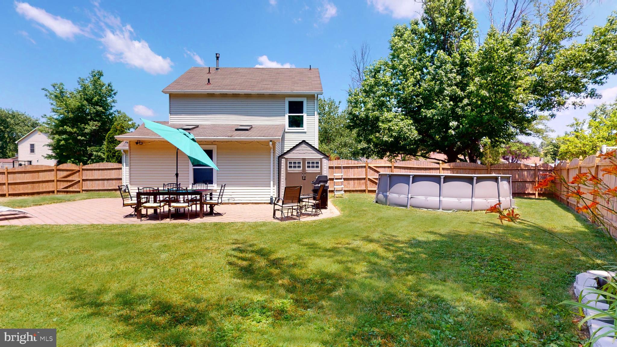 5 Carlton Avenue Evesham, NJ 08053 - Photo 33 of 33 a view of a house with backyard and sitting area