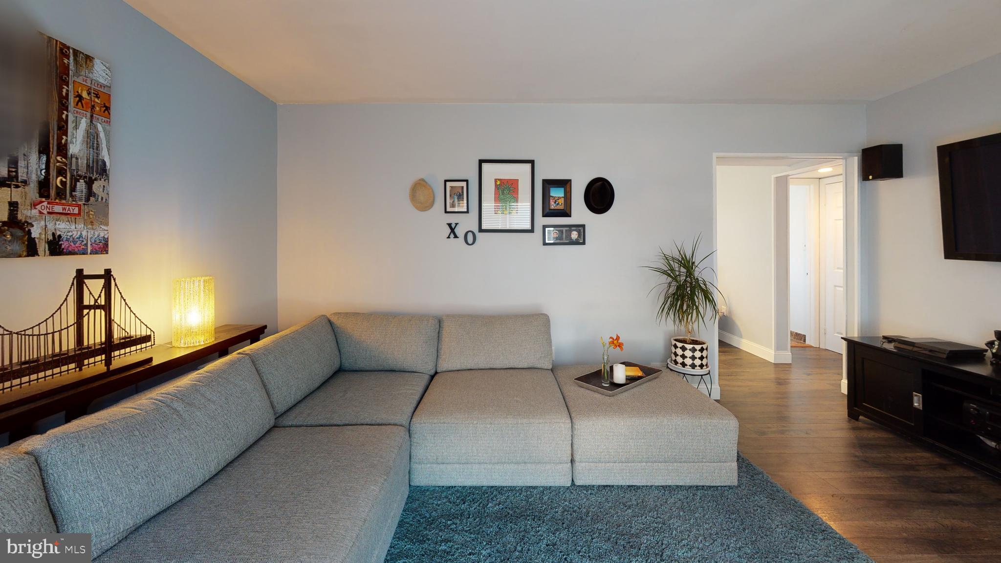 5 Carlton Avenue Evesham, NJ 08053 - Photo 5 of 33 a living room with furniture and a flat screen tv