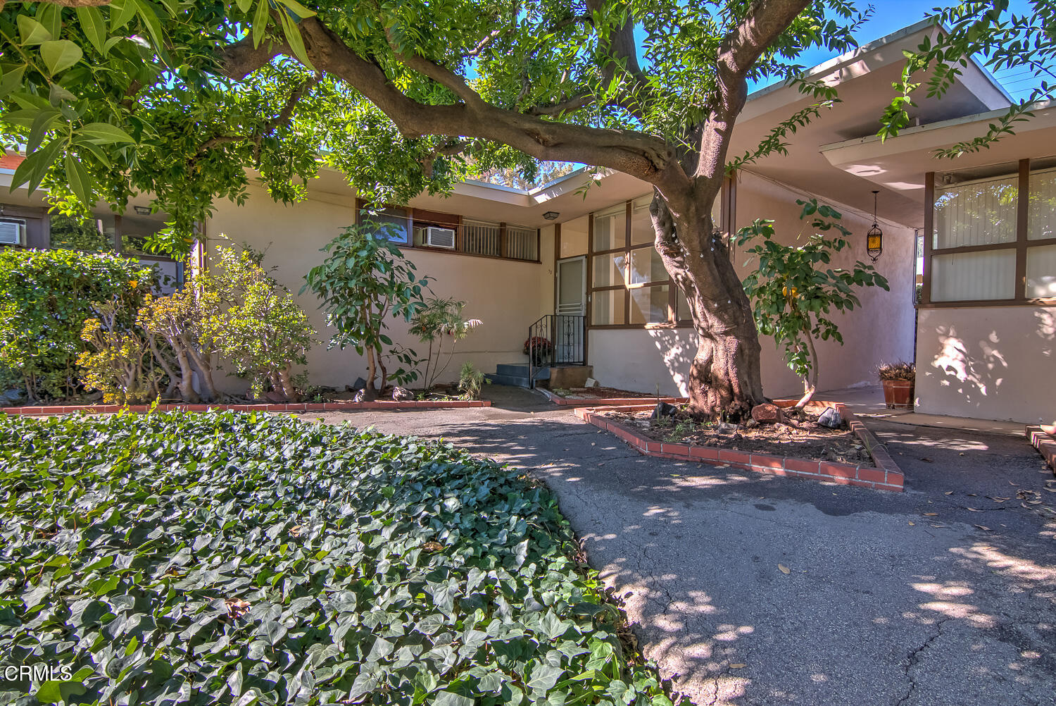 a view of a house with a street