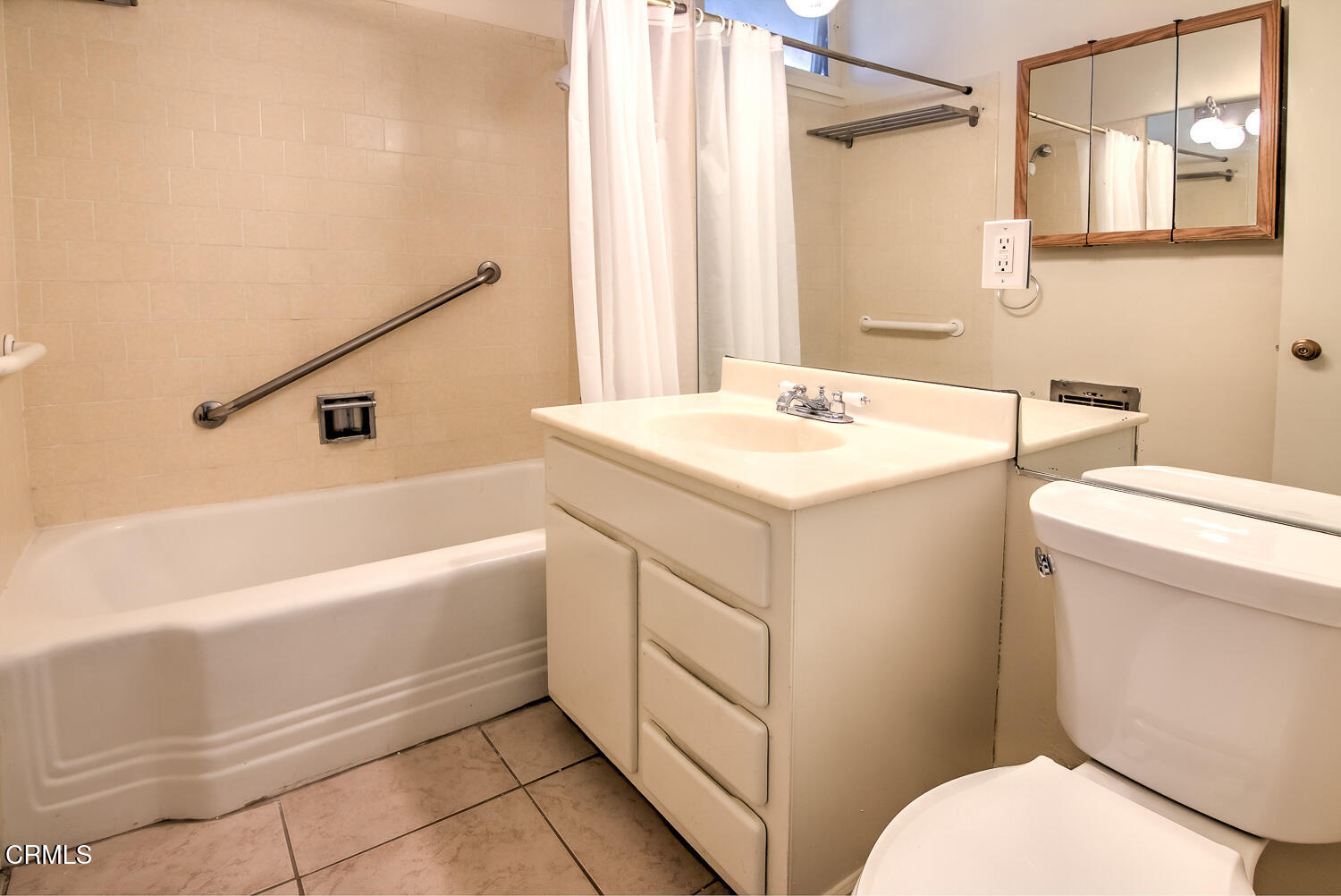 58 Avenue 64 Pasadena, CA 91105 - Photo 6 of 10 a bathroom with a sink toilet vanity and bathtub