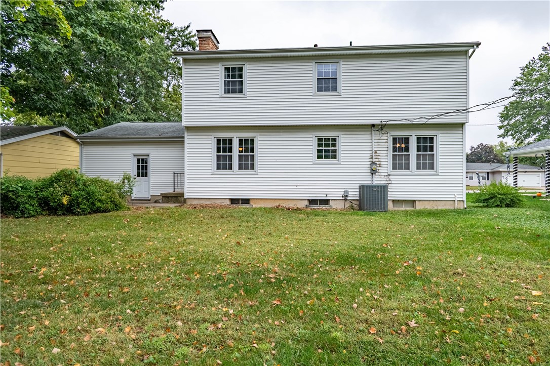 365 West Ash Avenue Decatur, IL 62526 - Photo 26 of 32 a front view of house with yard and green space