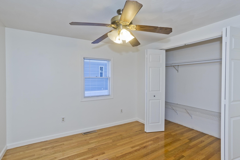 22 Pine View Three Rivers, MA 01080 - Photo 14 of 25 a view of an empty room with wooden floor