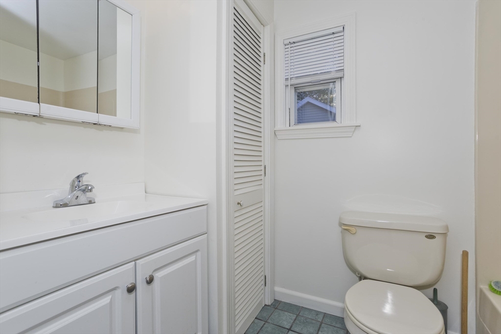 22 Pine View Three Rivers, MA 01080 - Photo 16 of 25 a bathroom with a toilet sink and mirror