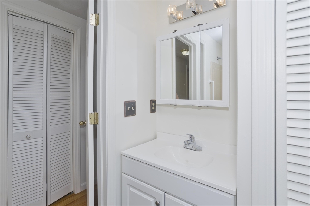 22 Pine View Three Rivers, MA 01080 - Photo 18 of 25 a bathroom with a sink and a mirror