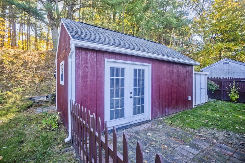 22 Pine View Three Rivers, MA 01080 - Photo 23 of 25 a front view of a house with a garden