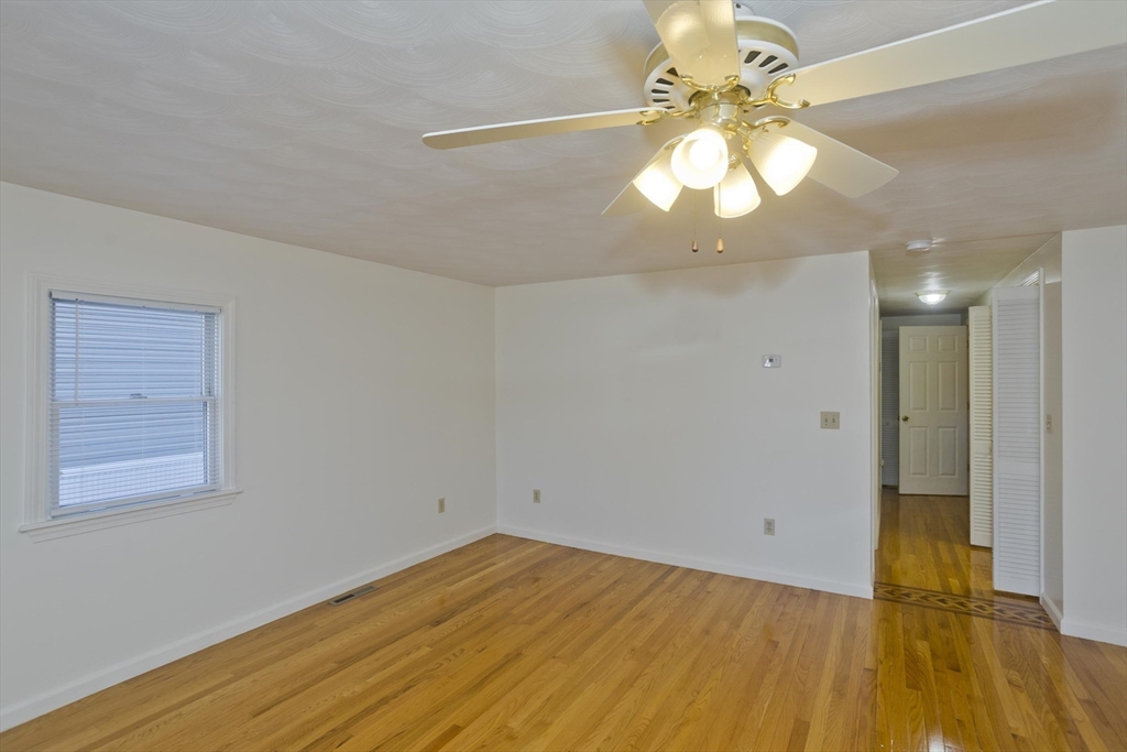 22 Pine View Three Rivers, MA 01080 - Photo 10 of 25 a view of an empty room and wooden floor