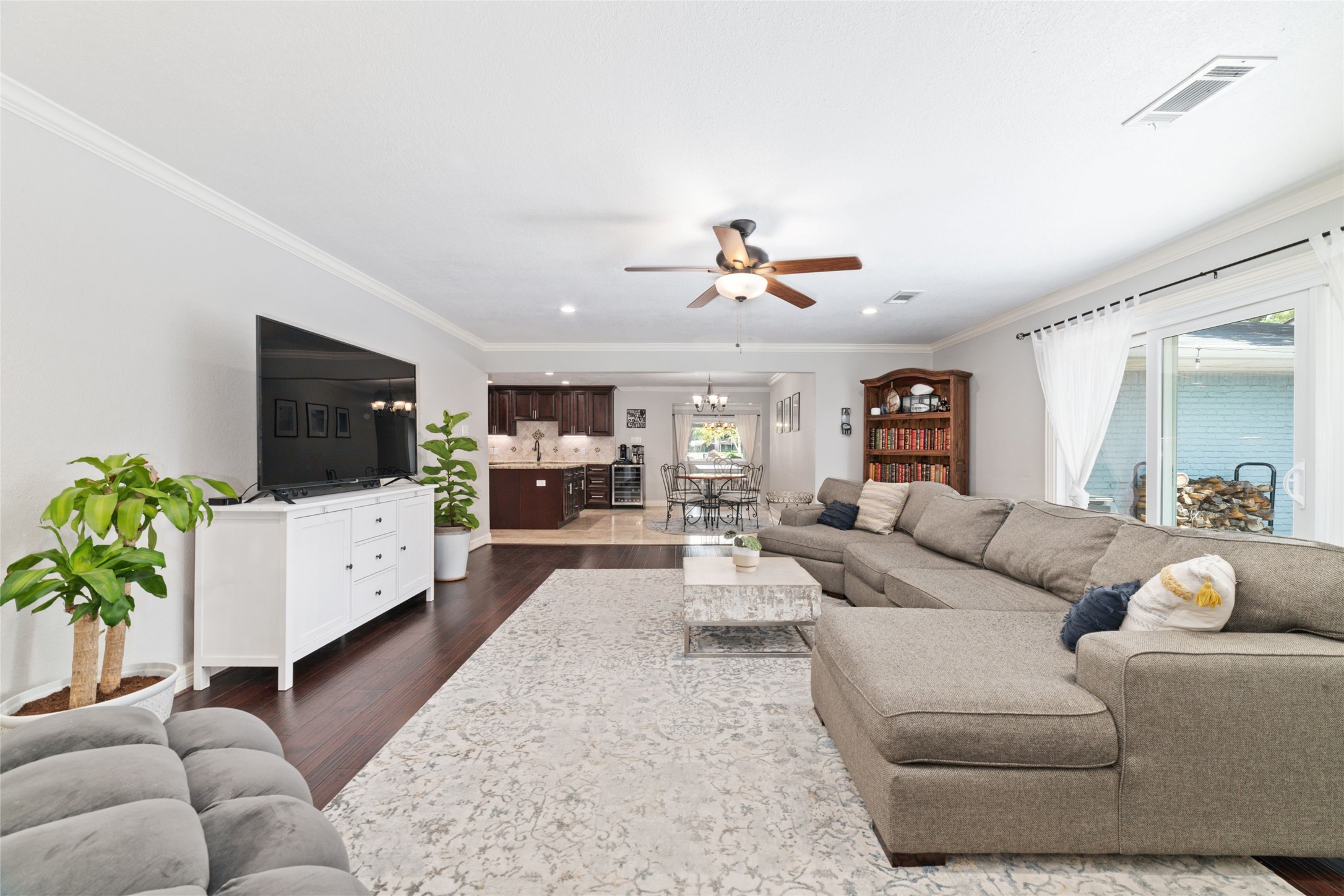 3815 April Lane Houston, TX 77092 - Photo 13 of 33 a living room with furniture and a flat screen tv