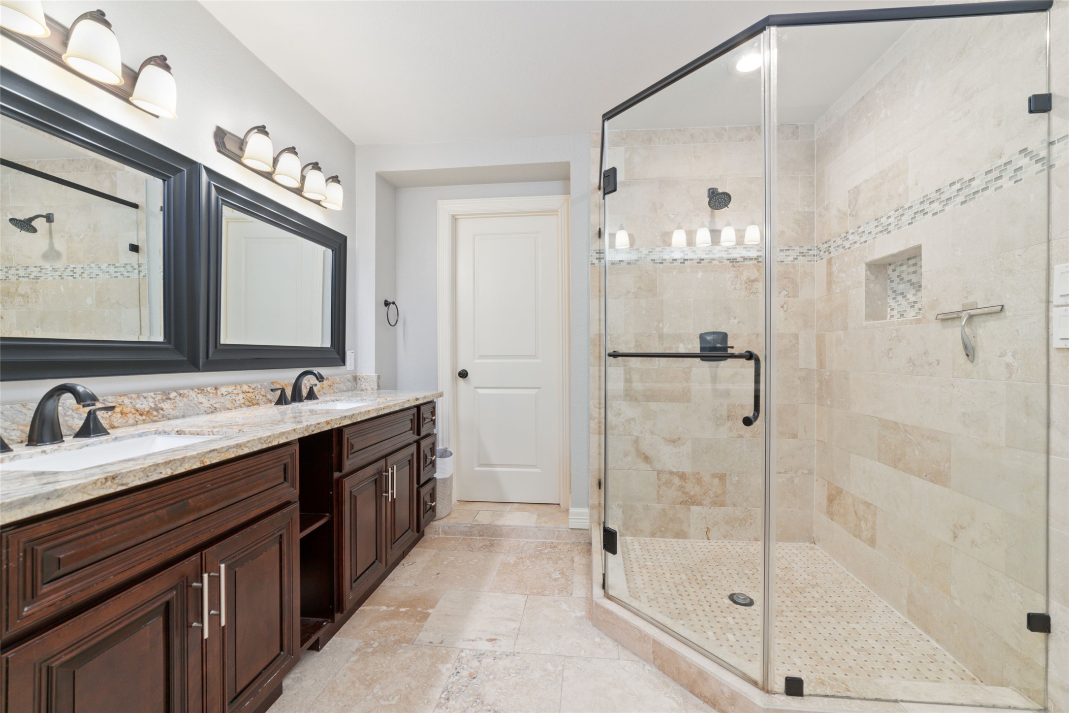 3815 April Lane Houston, TX 77092 - Photo 17 of 33 a bathroom with a double vanity sink mirror and shower