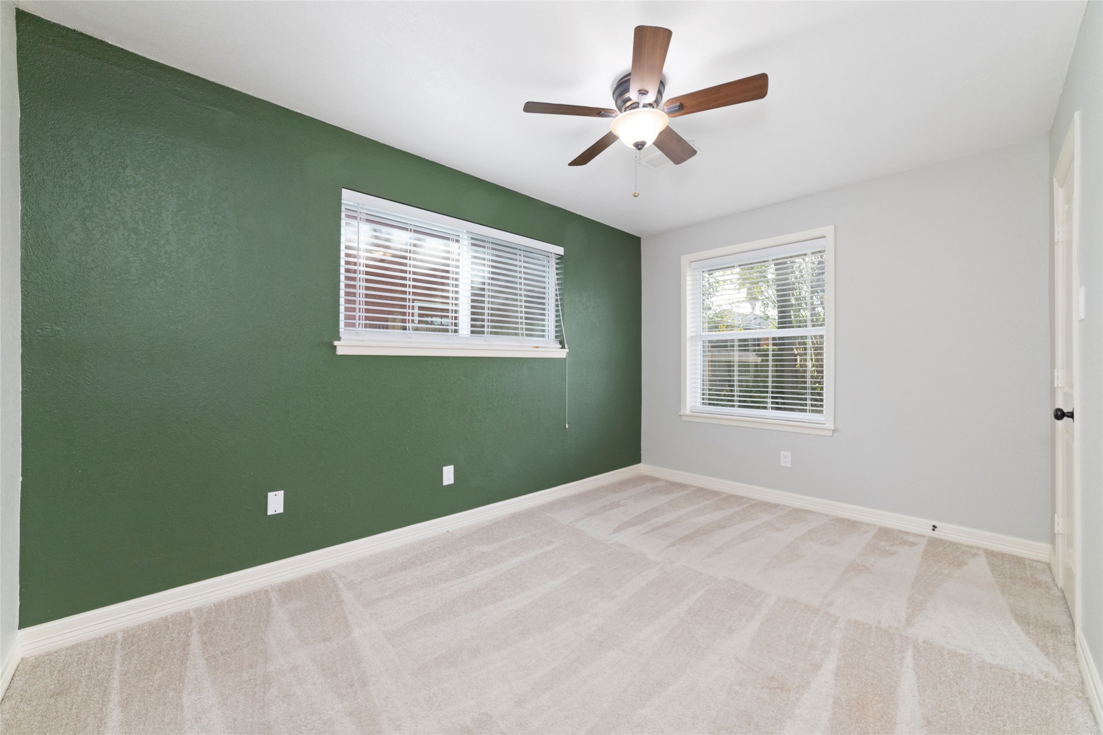 3815 April Lane Houston, TX 77092 - Photo 25 of 33 a view of a livingroom with a ceiling fan and window