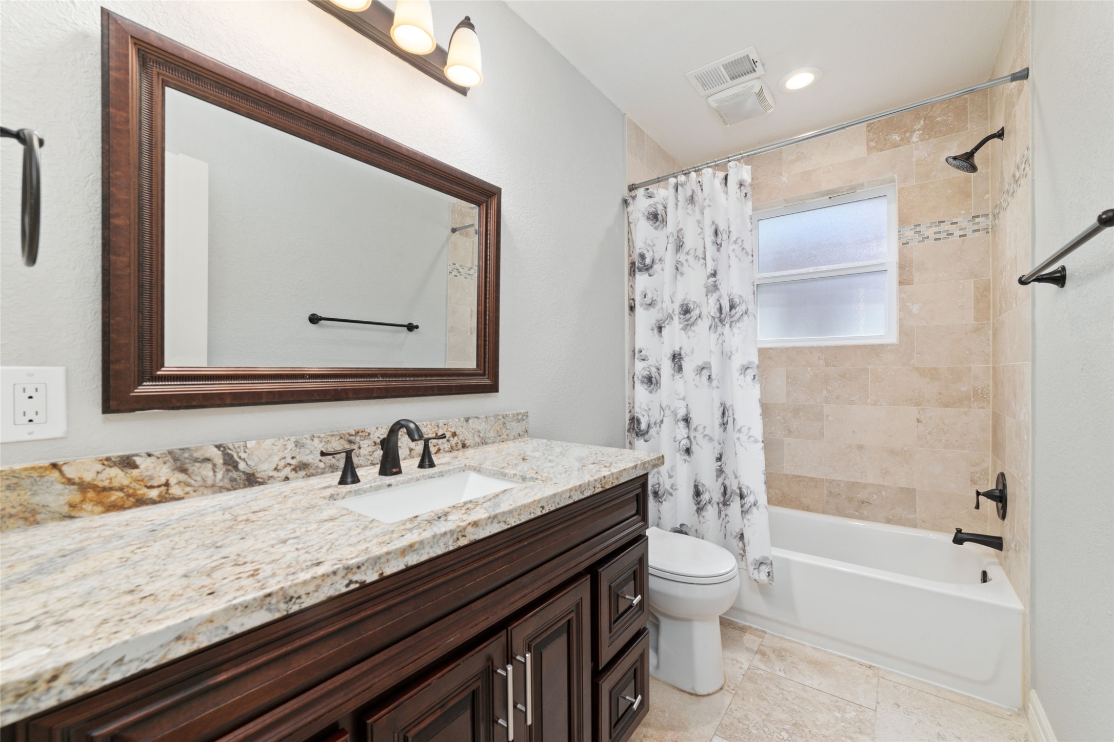 3815 April Lane Houston, TX 77092 - Photo 28 of 33 a bathroom with a granite countertop sink and a mirror