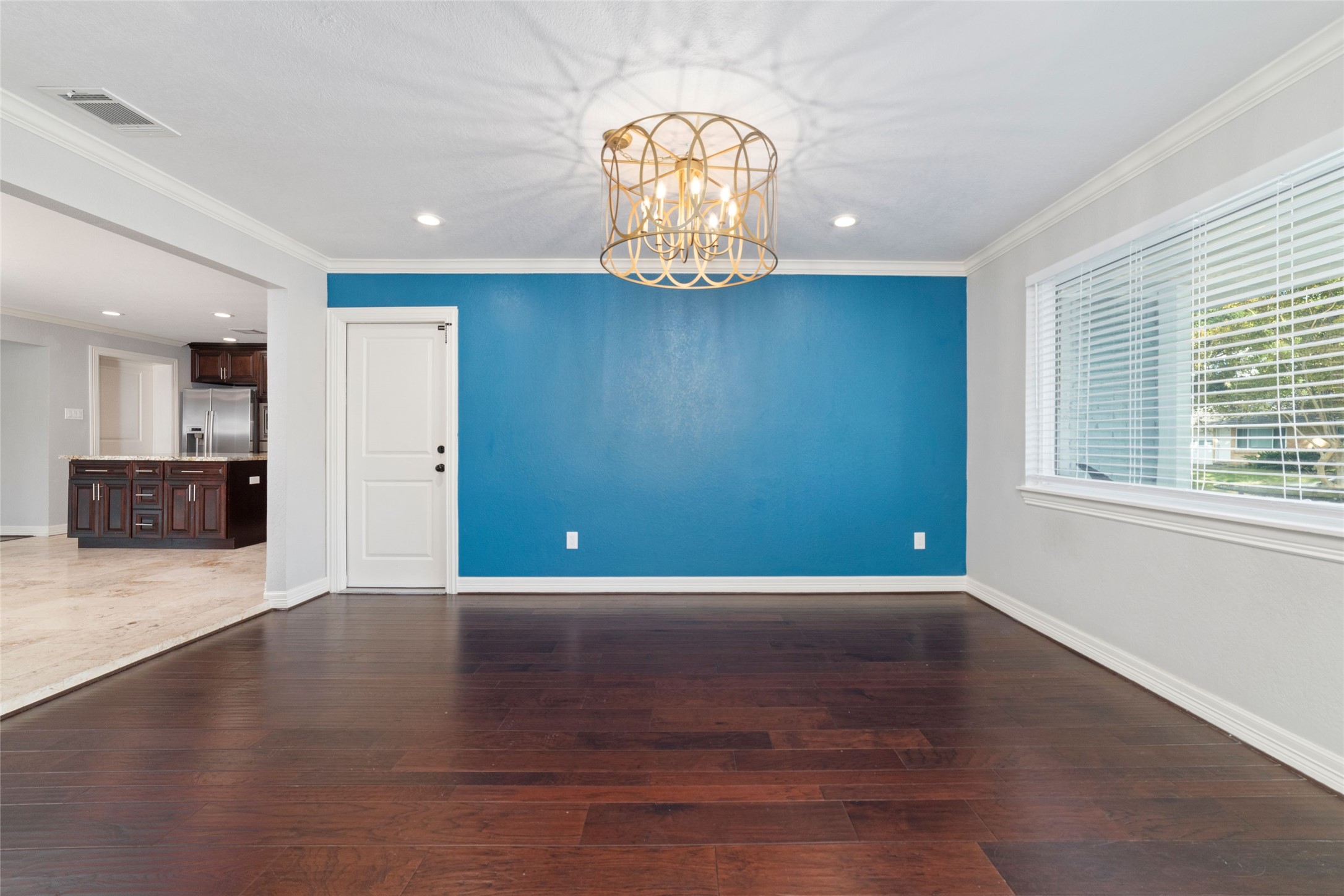 3815 April Lane Houston, TX 77092 - Photo 4 of 33 an empty room with wooden floor and windows