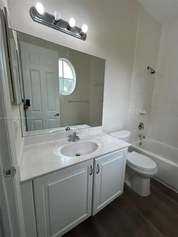 a view of balcony with a potted plant