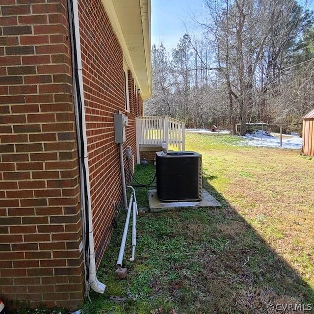 7867 Old Stage Road Dolphin, VA 23843 - Photo 19 of 19 a view of backyard with barbeque grill and wooden fence