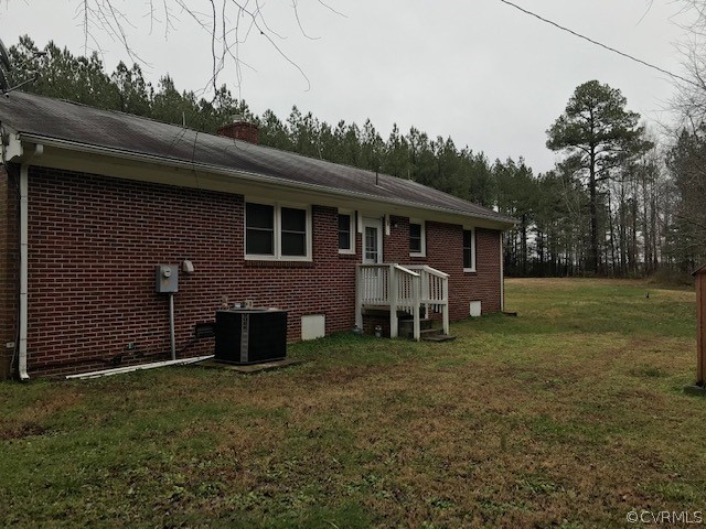7867 Old Stage Road Dolphin, VA 23843 - Photo 3 of 19 a front view of a house with a yard