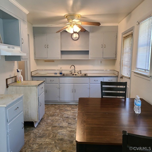 7867 Old Stage Road Dolphin, VA 23843 - Photo 10 of 19 a kitchen with kitchen island granite countertop a sink a stove and cabinets