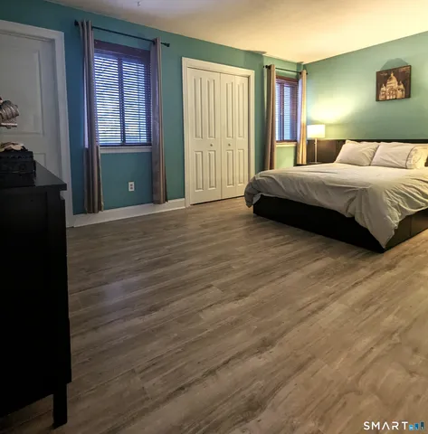 a room with furniture and flat screen tv