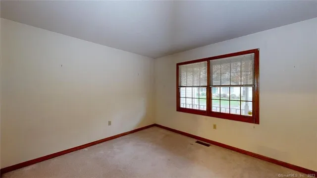 an empty room with a window