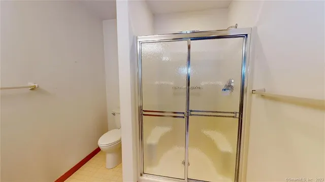 a bathroom with a sink and toilet