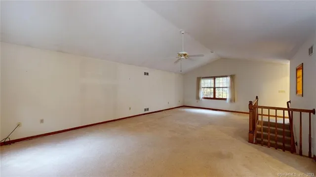 an empty room with windows