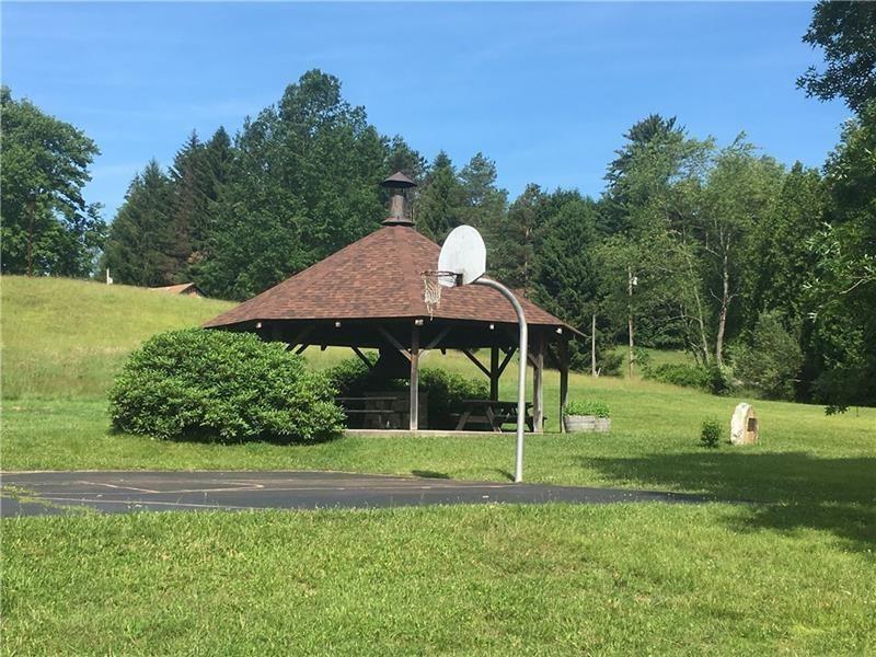 208 Chestnut Lane Chalk Hill, PA 15421 - Photo 25 of 40 a view of a park with a slide