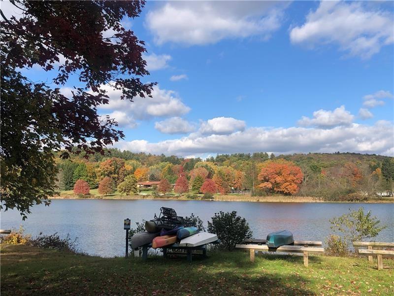 208 Chestnut Lane Chalk Hill, PA 15421 - Photo 29 of 40 a view of a lake with houses