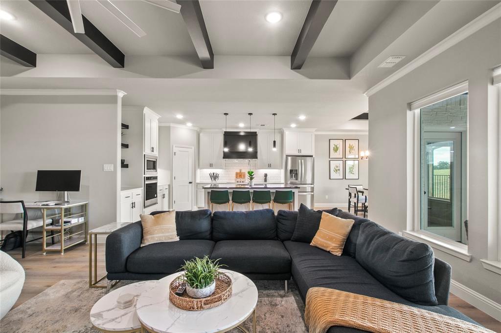 80 Dublin Circle Gordonville, TX 76245 - Photo 2 of 39 a living room with furniture and a fireplace