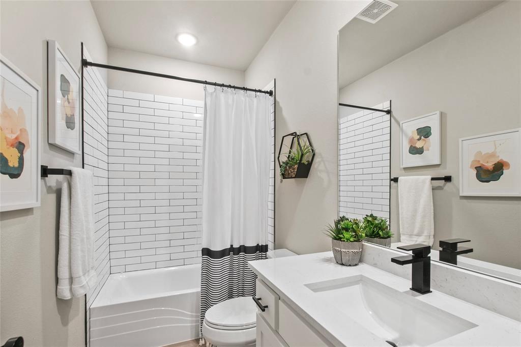 80 Dublin Circle Gordonville, TX 76245 - Photo 25 of 39 a bathroom with a sink toilet and shower
