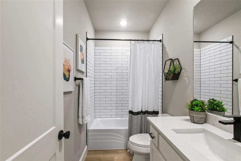 80 Dublin Circle Gordonville, TX 76245 - Photo 26 of 39 a bathroom with a shower a toilet and a sink