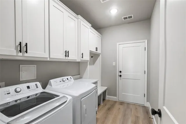 a view of utility room with washer and dryer