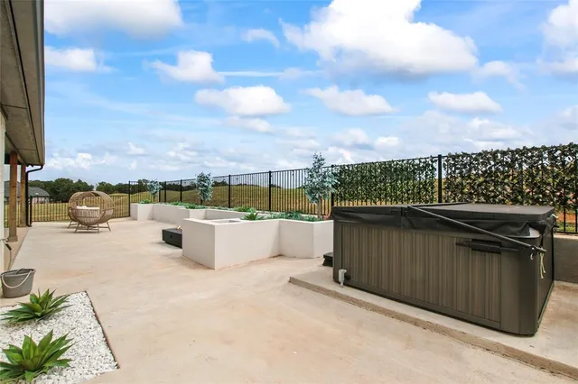 a terrace with a bench
