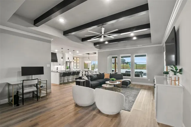 a living room with fireplace furniture and a flat screen tv