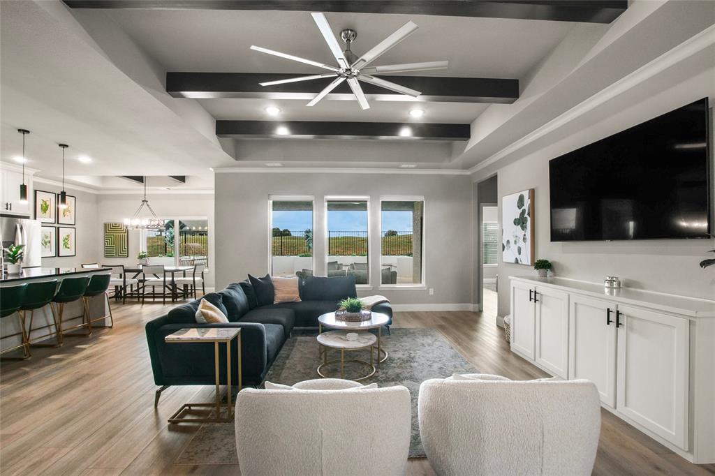 80 Dublin Circle Gordonville, TX 76245 - Photo 5 of 39 a living room with furniture fireplace and a flat screen tv