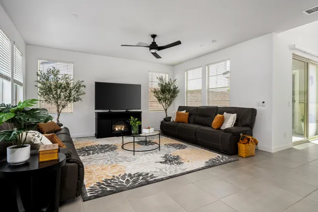 a outdoor dining space with furniture and a kitchen