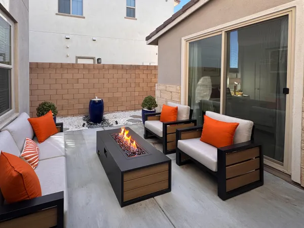 a view of swimming pool with seating area
