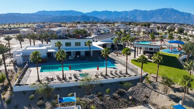 a bathroom with a granite countertop sink mirror and vanity