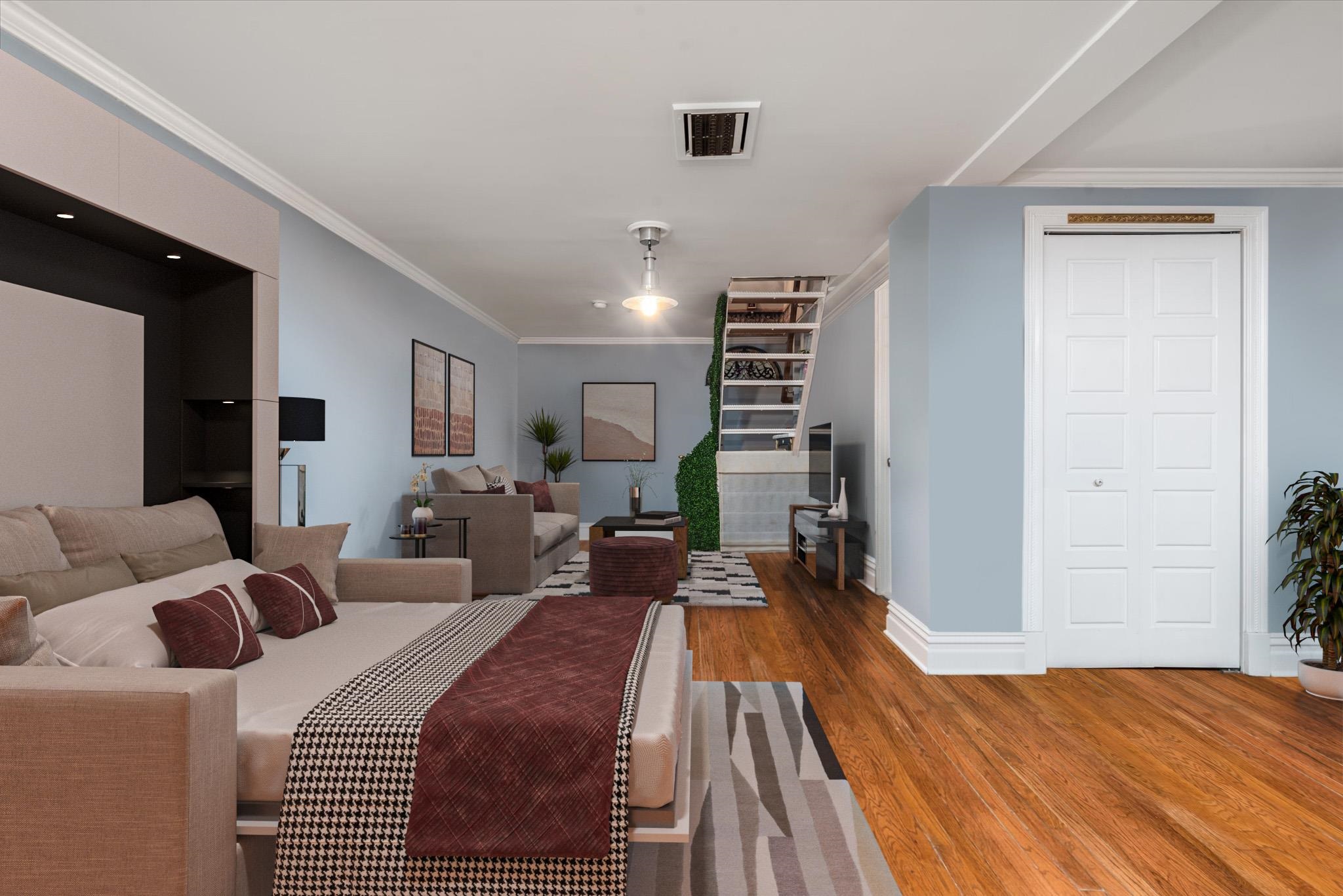 41-43 1st Street, Unit 1G Hoboken, NJ 07030 - Photo 20 of 26 a large bedroom with bed and wooden floor