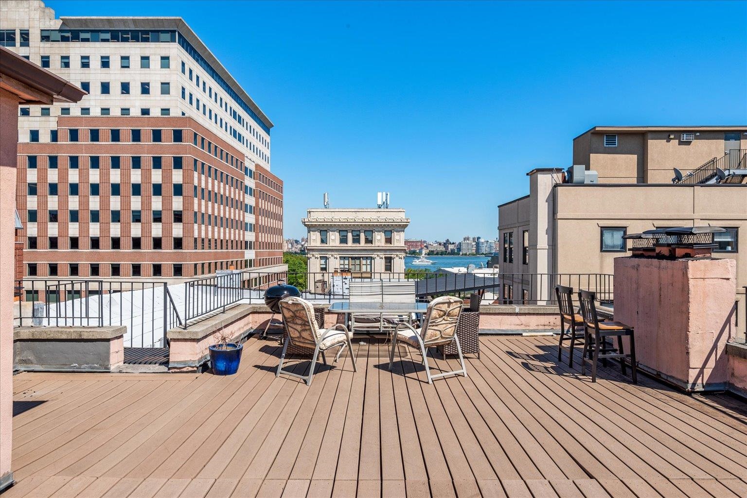 41-43 1st Street, Unit 1G Hoboken, NJ 07030 - Photo 23 of 26 a view of a balcony with chairs