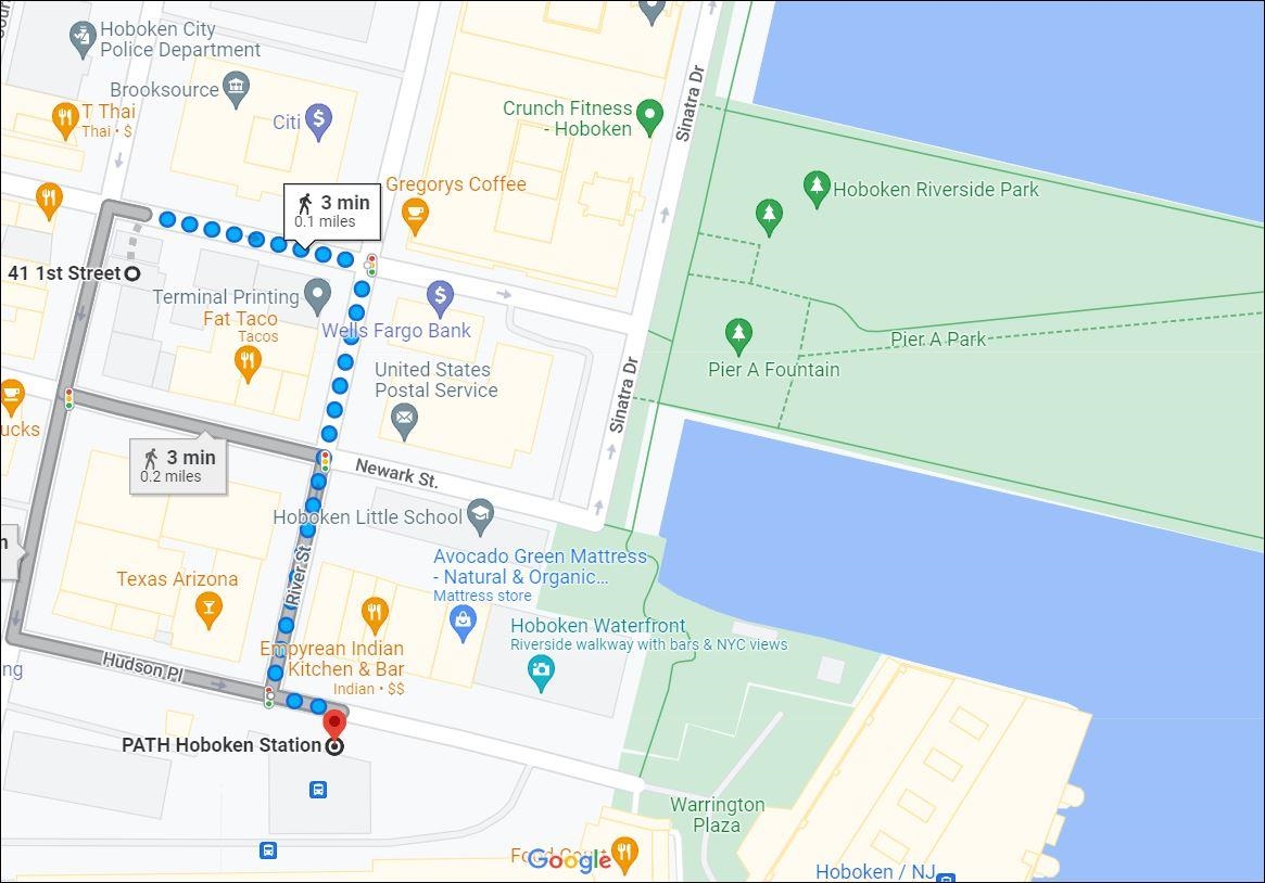 41-43 1st Street, Unit 1G Hoboken, NJ 07030 - Photo 25 of 26 a utility room with a baby crib with wooden floor